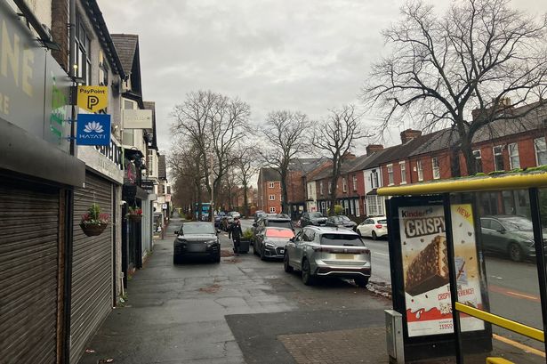 Cars park on pavements on busy Rose Lane. 