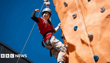 Family having a moment together messing about while winter sea swimming