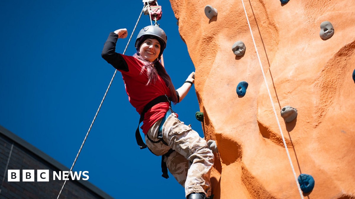 Family having a moment together messing about while winter sea swimming