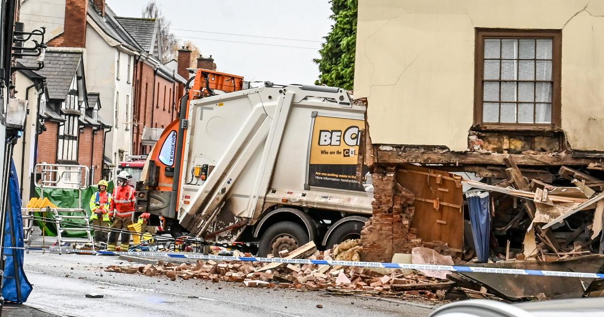 West Midlands: Man dies after bin lorry collides with building