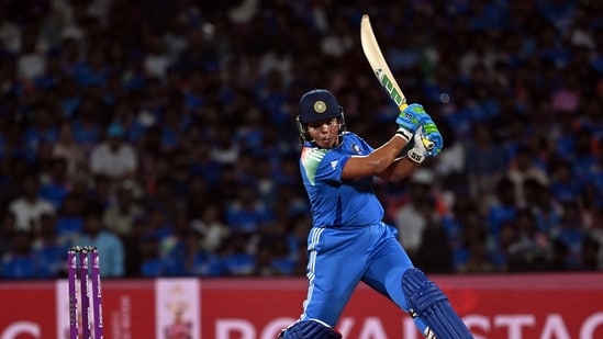 Richa Ghosh plays a shot against South Africa during the ICC Women's Cricket World Cup 2025 final match.(Raju Shinde)