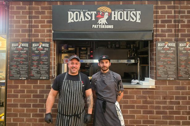 Pattersons' Roast House staff members George Niros and Rhys Carr at the Blackstone Market