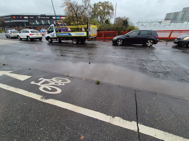 The puddle often appears during wet weather