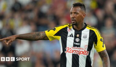 Jerome Boateng points while on the pitch