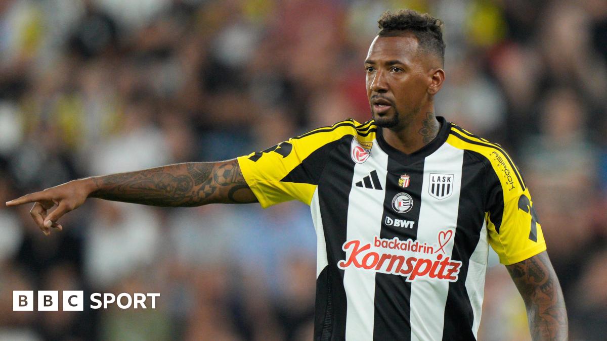 Jerome Boateng points while on the pitch