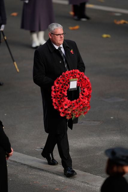 DUP leader Gavin Robinson lays a wreath in London. Yui Mok/PA Wire