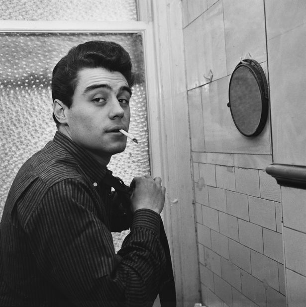 Actor Ian McShane smoking a cigarette. October 4, 1962