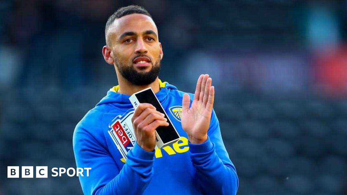 Kemar Roofe applauds during his time with Leeds United
