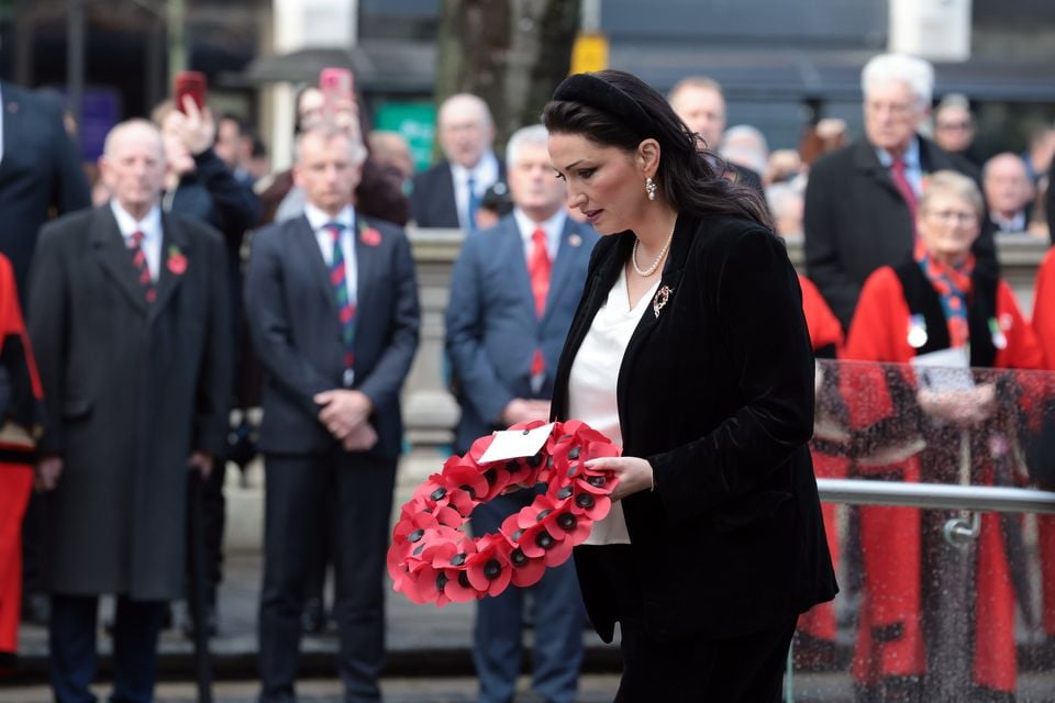Emma Little-Pengelly lays a wreath at City Hall today. Pacemaker