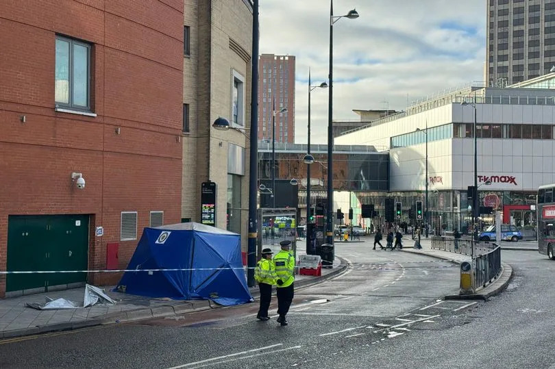 The tragic scene in Smallbrook Queensway in Birmingham city centre (with a blue tent by a bus stop) where Katie Fox suffered stab wounds and later died