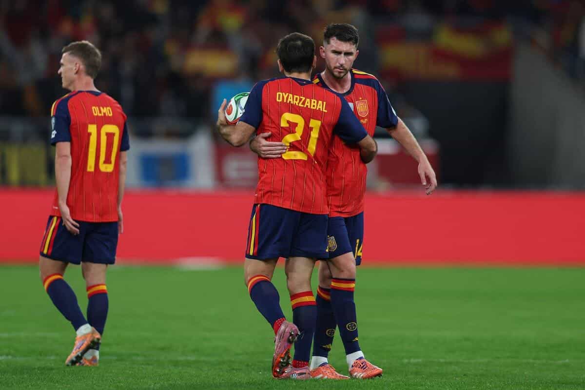 Spain and Switzerland end campaigns unbeaten while Belgium and Romania record big wins