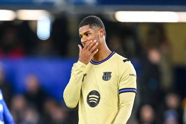 Marcus Rashford wipes his face