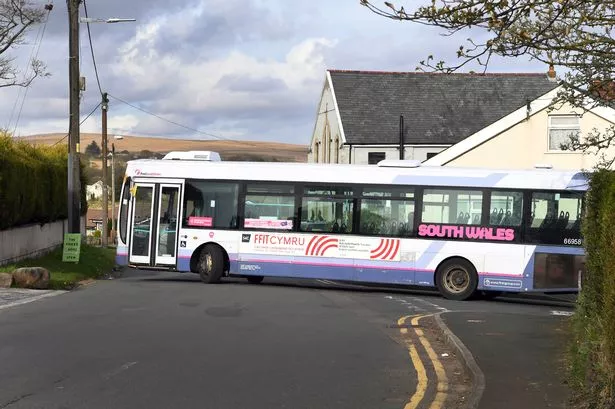 A general view of a bus travelling on a route in Wales