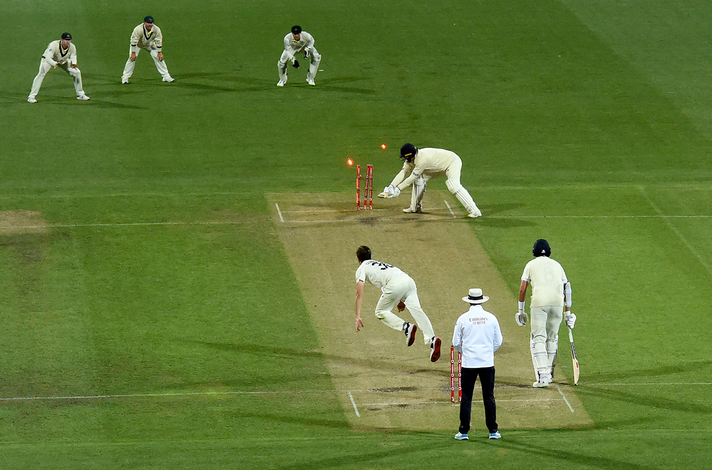 The final wicket: Ollie Robinson backs away to leg and is bowled by Pat Cummins' yorker to end the Ashes 4-0 in Australia's favour The final wicket: Ollie Robinson backs away to leg and is bowled by Pat Cummins' yorker to end the Ashes 4-0 in Australia's favour