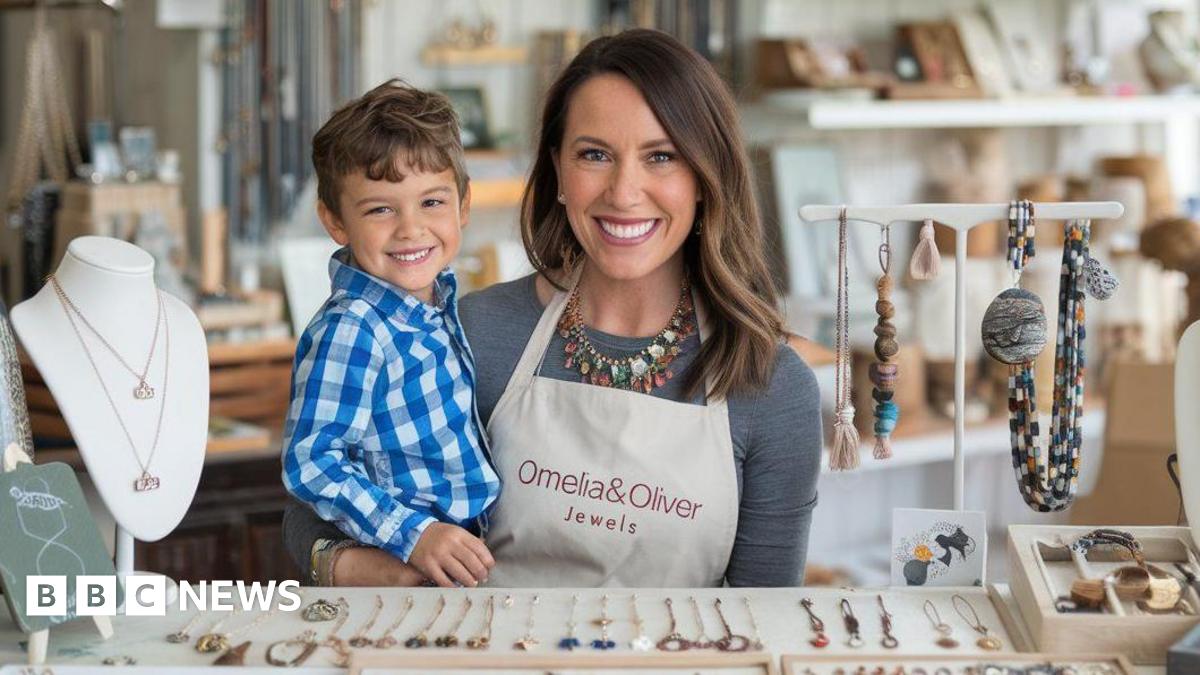 An AI-generated image showing a woman with brown hair holding a child in her arms and standing next to a table filled with necklaces.