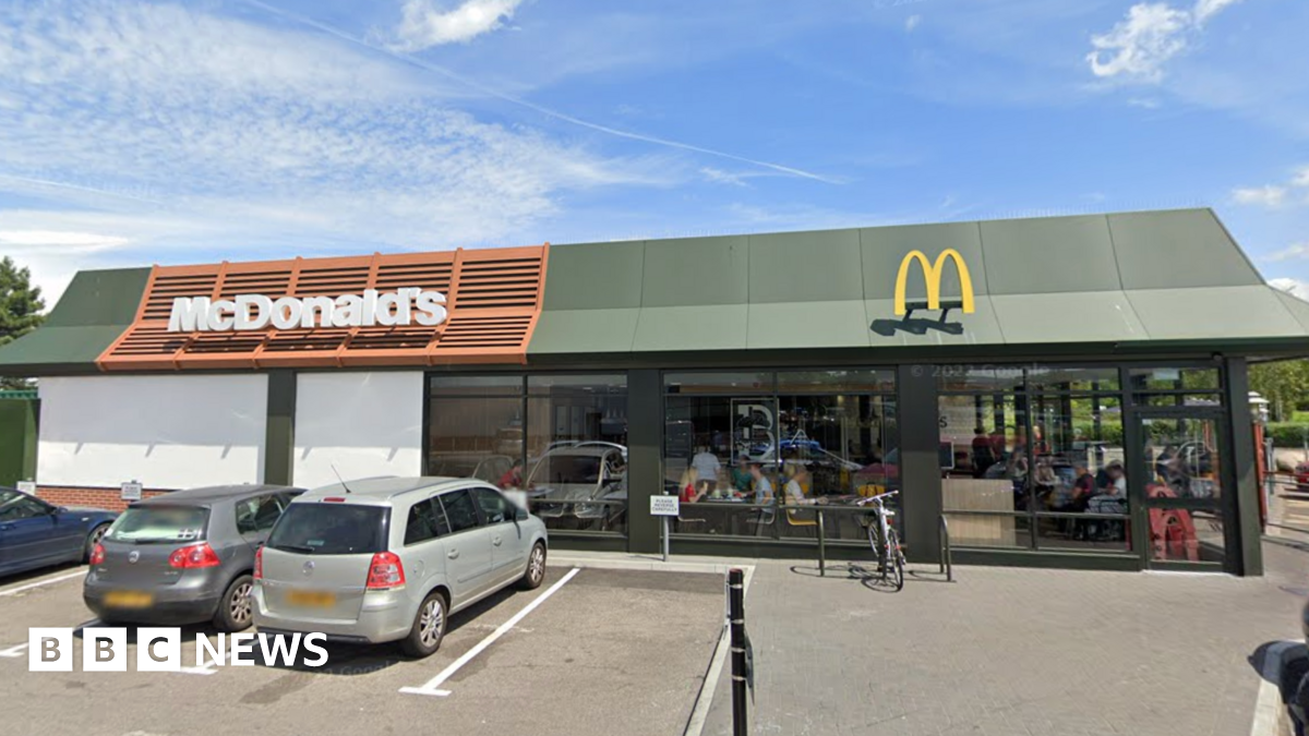 Family having a moment together messing about while winter sea swimming