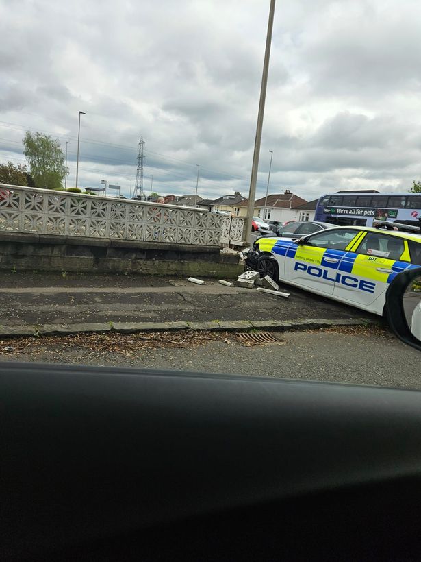 A police car crashed into a wall by Glasgow Road