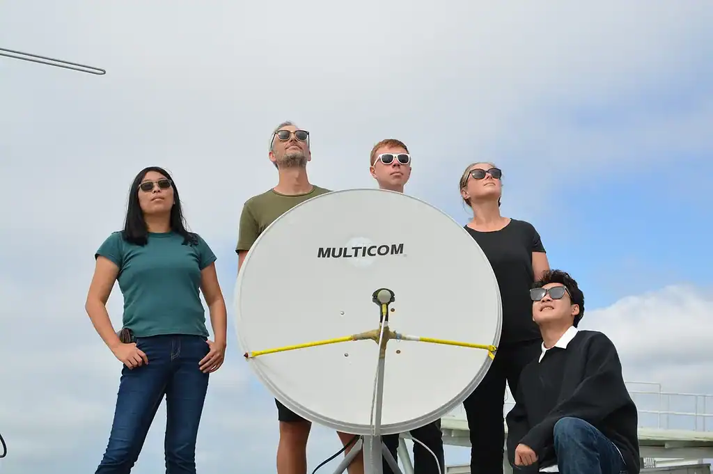 The research team with their satellite dish