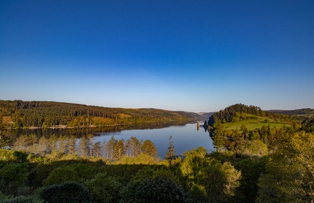 view of lake and hillsides