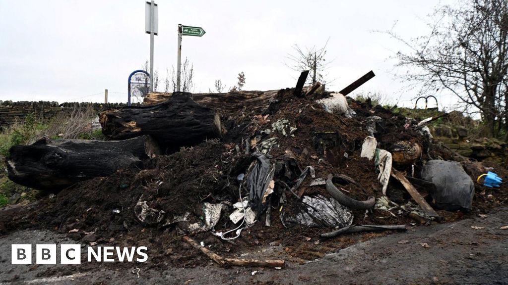 Waste fly-tipped on land near entrance to Black Carr Woods
