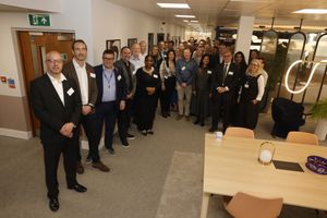 Staff from Smiths mark the opening of the company's new offices in Birmingham