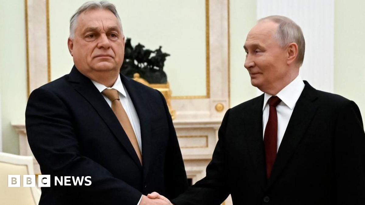 Russian President Vladimir Putin (R) and Hungarian Prime Minister Viktor Orban shake hands during a meeting at the Kremlin in Moscow, Russia, 28 November 2025.