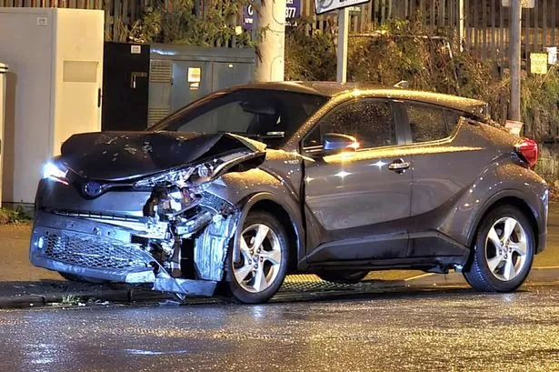 A woman was taken to hospital after a crash