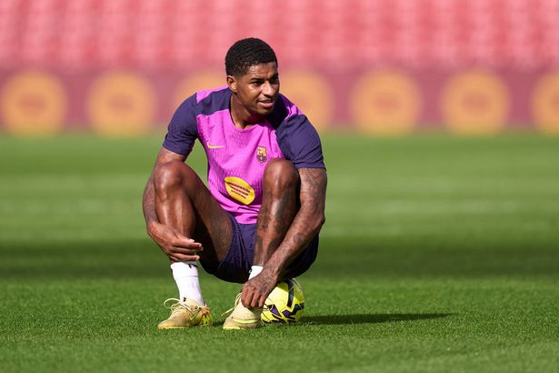 Marcus Rashford sits