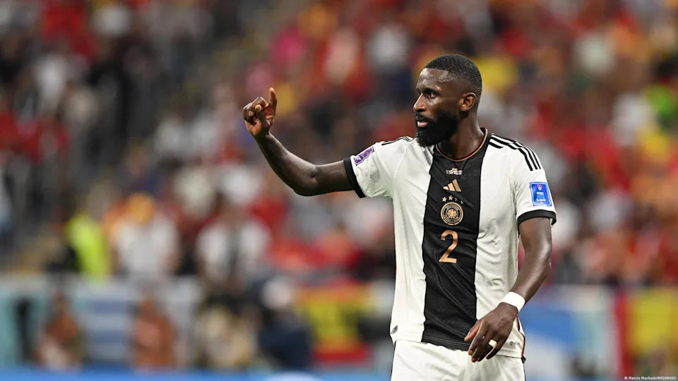 2022-23: Single black stripe for the men and women - The 2022 World Cup in Qatar was a similar disaster for the German men to four years earlier in Russia. The design, with its wide black stripe down the middle was inspired by the original German jersey from 1908. This was also the first time that an identical jersey would be worn by the men and women. Germany's women wore this jersey in a similarly unsuccessful World Cup down under in 2023.<span class="copyright">Marcio Machado/MIS/IMAGO</span>