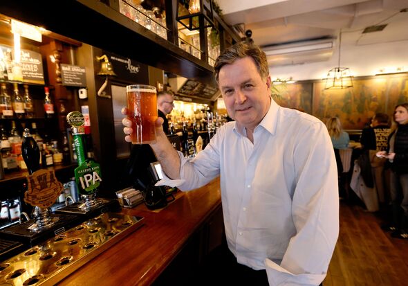 Sir Mel Stride in pub