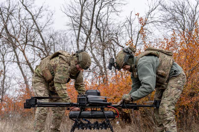 Ukrainian soldiers with the Kraken 1654 unit preparing a drone