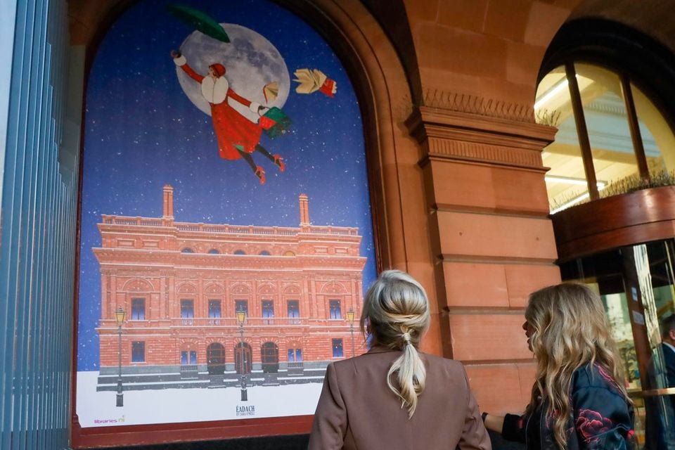 First Minister Michelle O'Neill and Millie creator Sara O'Neill at the Christmas card packing day 