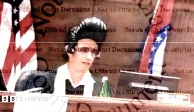 Family having a moment together messing about while winter sea swimming