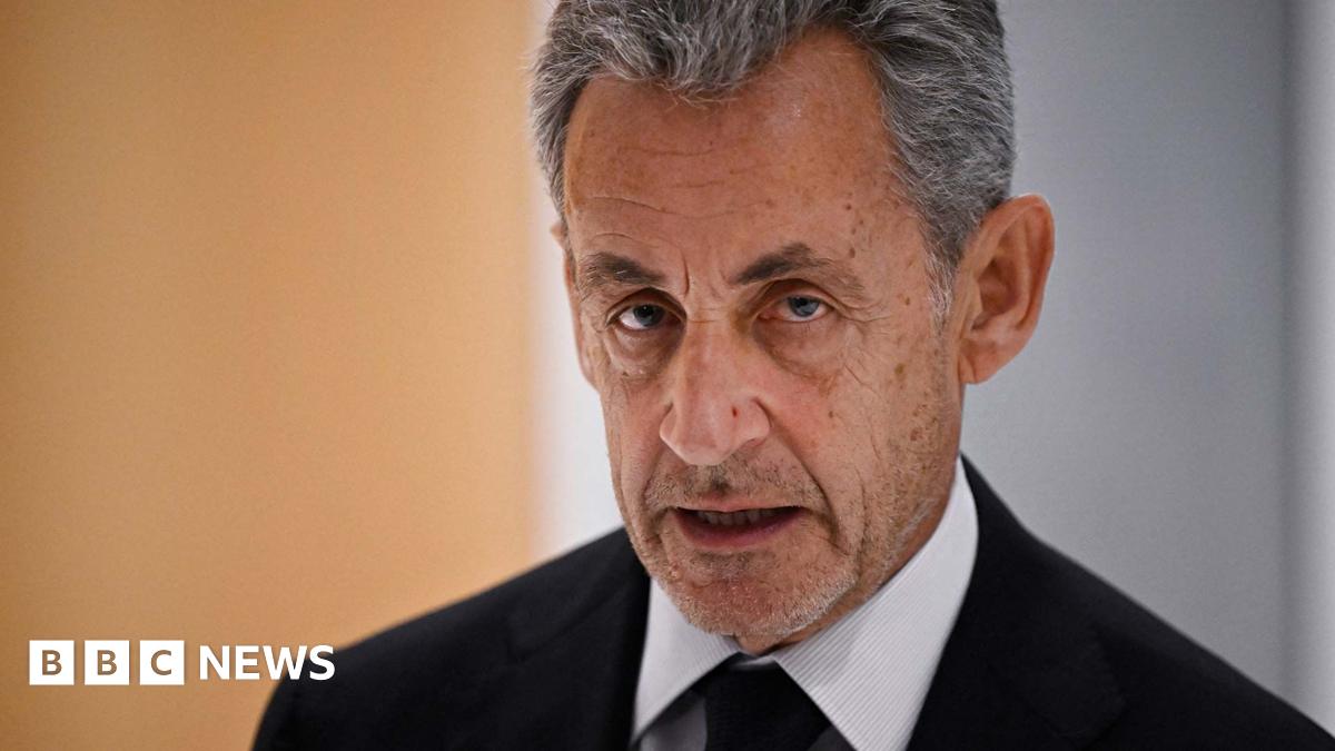 Former French president Nicolas Sarkozy leaves after the verdict in his trial for illegal campaign financing from Libya for his successful 2007 presidential bid, at the Tribunal de Paris courthouse in Paris, on September 25, 2025.