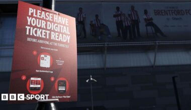 A sign outside the stadium asking fans to have their digital ticket ready