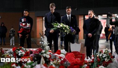 Xabi Alonso head coach of Real Madrid, Dean Huijsen of Real Madrid and former Liverpool player Trent Alexander-Arnold of Real Madrid laying a wreath in memory of Liverpool player Diogo Jota at Anfield on November 03, 2025 in Liverpool, England.