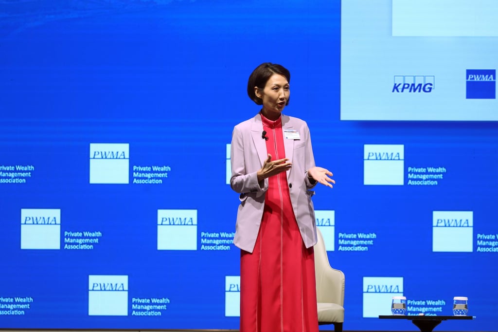 Vivien Khoo, CEO and managing director of the Private Wealth Management Association, attends the annual wealth management report summit on Thursday. Photo: Edmond So