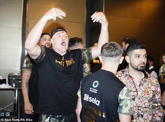 Fury's unpredictable father John, who headbutted a member of Usyk's entourage ahead of their fight last May, also doesn't want him to return to the ring, Warren has claimed