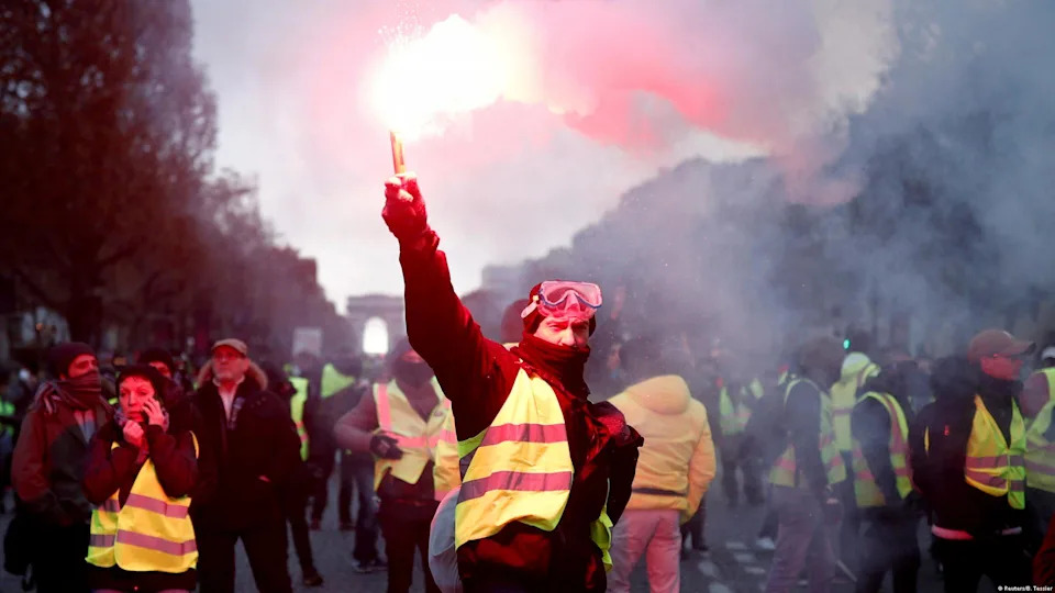 Clashes and destruction - The Macron government says it won't back down, and further protests are scheduled. On November 24, some 100,000 people protest nationwide, with 8,000 in Paris, where violence and destruction breaks out. Police clash with protesters on the Champs-Elysees (above), using water canon and tear gas. Over €1 million ($1.1 million) in damage is reported.<span class="copyright">Reuters/B. Tessier</span>