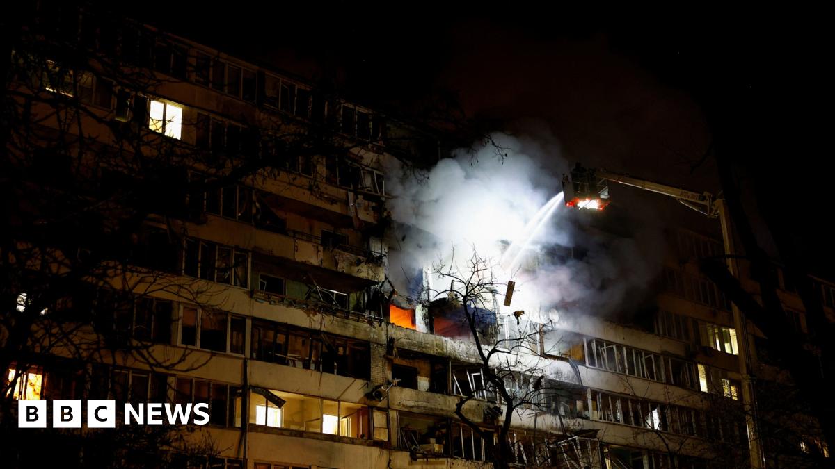 A firefighter works at the site of an apartment building hit by a Russian drone strike in Kyiv, Ukraine on 25 November 2025.