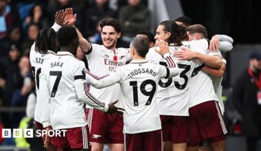 Arsenal players celebrate scoring against Burnley