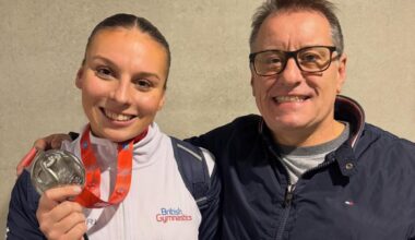 Alisha Evanson proudly wears her world championships team silver medal alongside her Cheshire Gymnastics coach Mark Hudson &lt;i&gt;(Image: Contributed)&lt;/i&gt;