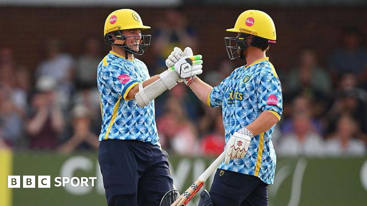 Tom Latham of Birmingham Bears celebrates his century during the Vitality Blast Men group stage match against Derbyshire Falcons