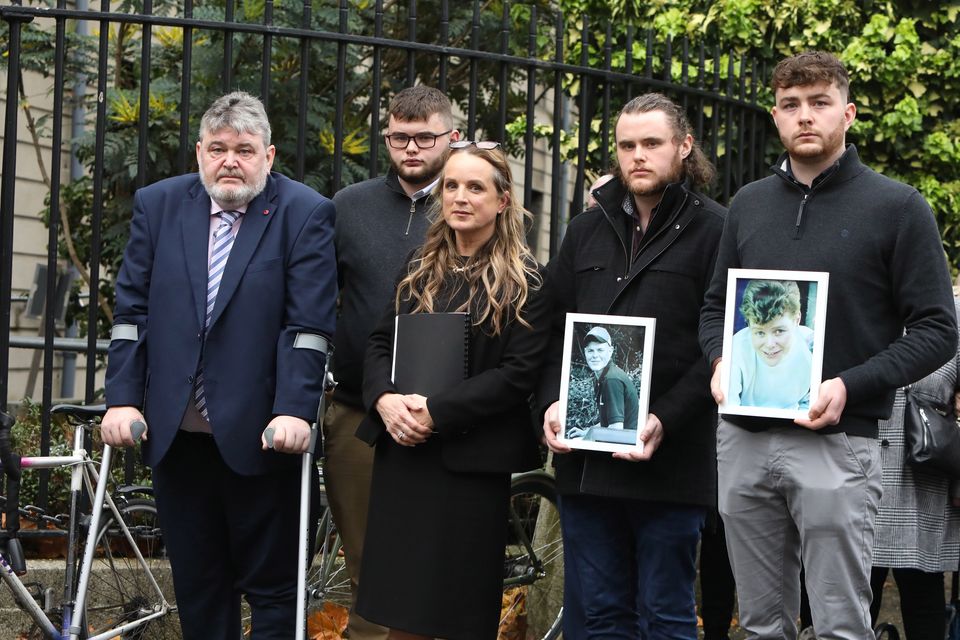 Kevin Fitzpatrick (striped tie) with his solicitor, Niamh Ni Mhurchu of Callan Tansey, and his three children outside court today (Photo: Collins Courts)