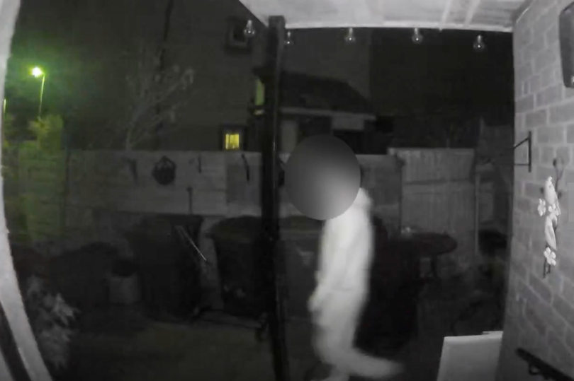 Moment Edinburgh mum spots man in garden while police search for runaway driver