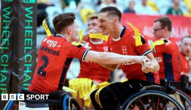 England's Rob Hawkins celebrates scoring a try with Jack Brown