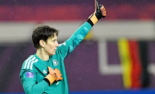 Germany's goalkeeper Ann-Katrin Berger reacts during the women's nations league soccer match between Germany and Spain in Kaiserslautern, Germany, Friday Nov. 28, 2025. (Uwe Anspach/dpa via AP)