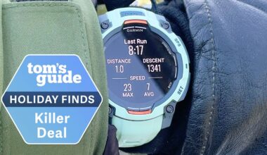 Garmin Instinct 3 close-up on the author&#039;s wrist while snowboarding