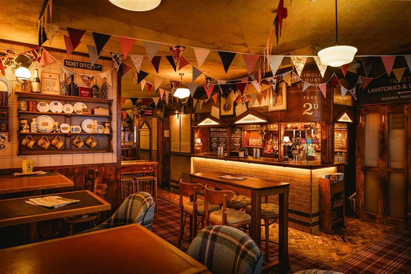 cahoots cocktail bar in london with vintage decor