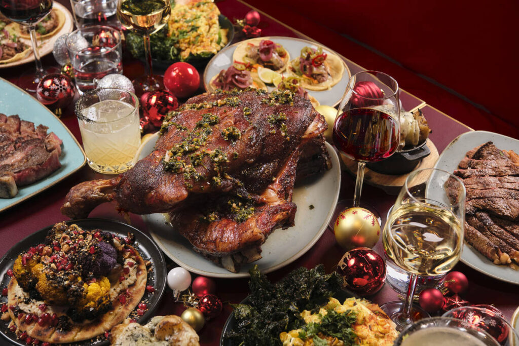 an array of smoked and BBQd meats and meat dishes from tempers festive menu